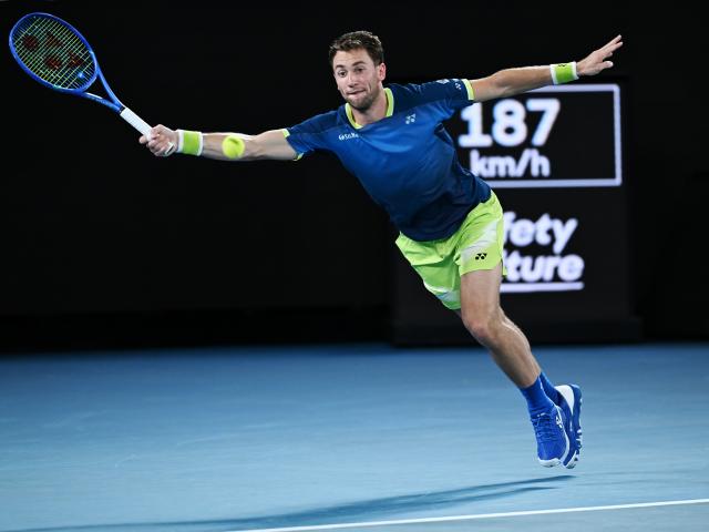 (260126) -- MELBOURNE, Jan. 26, 2026 (Xinhua) -- Casper Ruud hits a return during the men's singles 4th round match between Ben Shelton of the United States and Casper Ruud of Norway at the Australian Open tennis tournament in Melbourne, Australia, Jan. 26, 2026. (Photo by Wang Shen/Xinhua)