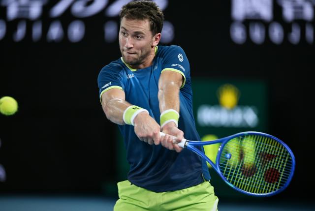 (260126) -- MELBOURNE, Jan. 26, 2026 (Xinhua) -- Casper Ruud hits a return during the men's singles 4th round match between Ben Shelton of the United States and Casper Ruud of Norway at the Australian Open tennis tournament in Melbourne, Australia, Jan. 26, 2026. (Photo by Wang Shen/Xinhua)
