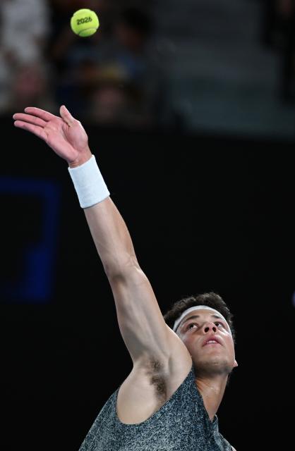 (260126) -- MELBOURNE, Jan. 26, 2026 (Xinhua) -- Ben Shelton serves during the men's singles 4th round match between Ben Shelton of the United States and Casper Ruud of Norway at the Australian Open tennis tournament in Melbourne, Australia, Jan. 26, 2026. (Photo by Wang Shen/Xinhua)