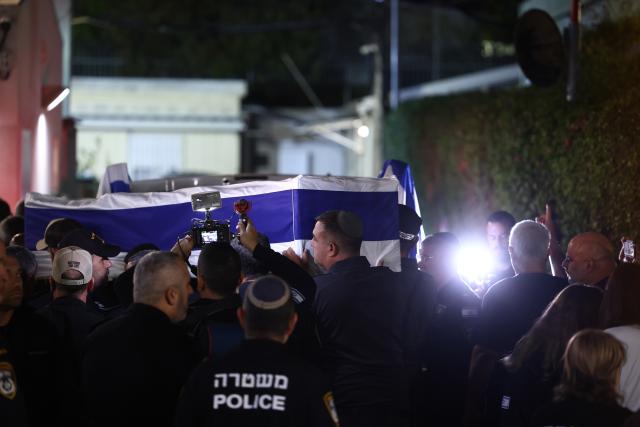 (260126) -- TEL AVIV, Jan. 26, 2026 (Xinhua) -- A coffin containing the remains of Ran Gvili is transported to a forensic institute in Tel Aviv, Israel, Jan. 26, 2026. The remains of Ran Gvili, the last hostage held in the Gaza Strip, had been identified and taken to Israel for burial, Israeli officials announced on Monday. (Photo by Jamal Awad/Xinhua)