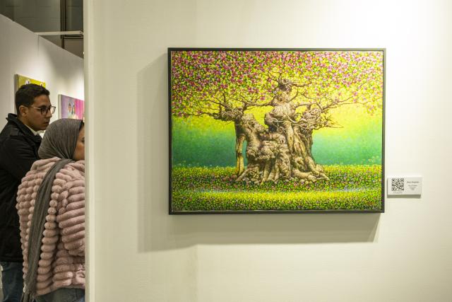 (260126) -- GIZA, Jan. 26, 2026 (Xinhua) -- People visit the Art Cairo at the Grand Egyptian Museum in Giza, Egypt, Jan. 26, 2026. The 7th edition of Art Cairo was held from Jan. 23 to 26, 2026 at the Grand Egyptian Museum. (Xinhua/Xin Mengchen)