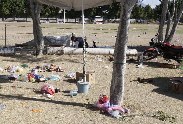 (260126) -- SALAMANCA, Jan. 26, 2026 (Xinhua) -- A man works beside the soccer field where a shooting occurred on Sunday, in Salamanca, Mexico's central state of Guanajuato, Jan. 26, 2026. Gunmen opened fire during an amateur soccer match in central Mexico on Sunday, killing at least 11 people and wounding 12 others, local authorities said. (Photo by Mario Armas/Xinhua)