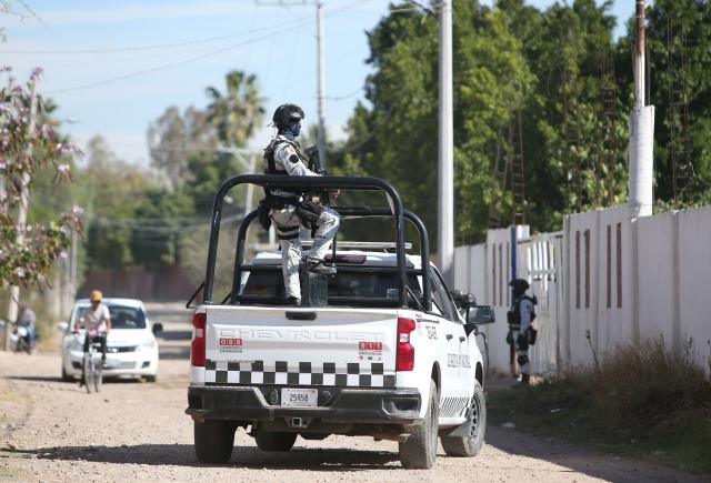 (260126) -- SALAMANCA, Jan. 26, 2026 (Xinhua) -- Security personnel patrol near the soccer field where a shooting occurred on Sunday, in Salamanca, Mexico's central state of Guanajuato, Jan. 26, 2026. Gunmen opened fire during an amateur soccer match in central Mexico on Sunday, killing at least 11 people and wounding 12 others, local authorities said. (Photo by Mario Armas/Xinhua)