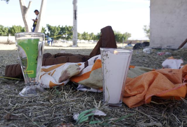 (260126) -- SALAMANCA, Jan. 26, 2026 (Xinhua) -- Candles are placed beside the soccer field where a shooting occurred on Sunday, in Salamanca, Mexico's central state of Guanajuato, Jan. 26, 2026. Gunmen opened fire during an amateur soccer match in central Mexico on Sunday, killing at least 11 people and wounding 12 others, local authorities said. (Photo by Mario Armas/Xinhua)