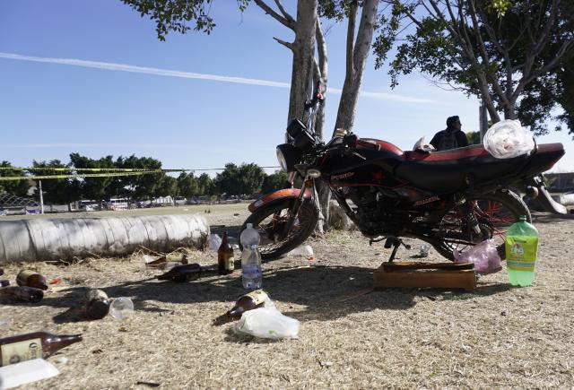 (260126) -- SALAMANCA, Jan. 26, 2026 (Xinhua) -- A man stands beside the soccer field where a shooting occurred on Sunday, in Salamanca, Mexico's central state of Guanajuato, Jan. 26, 2026. Gunmen opened fire during an amateur soccer match in central Mexico on Sunday, killing at least 11 people and wounding 12 others, local authorities said. (Photo by Mario Armas/Xinhua)