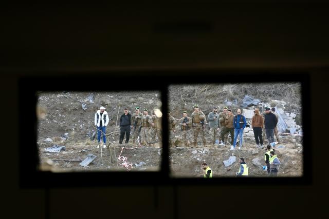 (260127) -- BEIJING, Jan. 27, 2026 (Xinhua) -- People gather at the scene of an Israeli airstrike in Kfardounine, southern Lebanon, Jan. 25, 2026. Two Hezbollah members were killed, and five other people injured on Sunday in Israeli airstrikes on southern Lebanon, Lebanon's state-run National News Agency (NNA) reported.
   The Israeli army has carried out frequent strikes in Lebanon, claiming they are aimed at removing Hezbollah "threats," despite a U.S.- and French-brokered ceasefire between Hezbollah and Israel that has been in effect since Nov. 27, 2024. (Photo by Ali Hashisho/Xinhua)