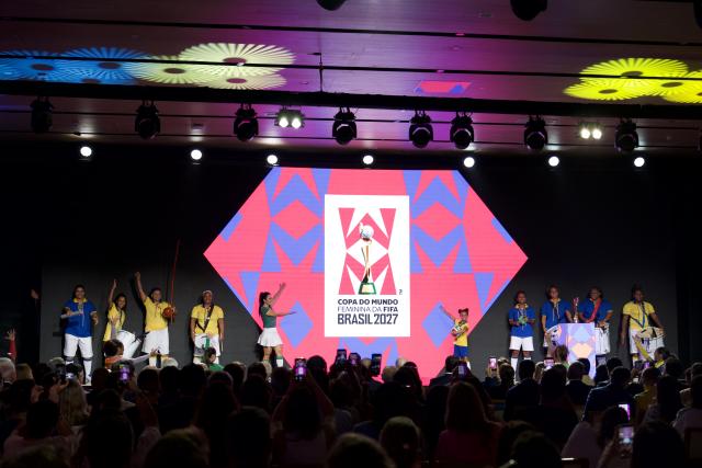 (260127) -- BEIJING, Jan. 27, 2026 (Xinhua) -- The emblem and slogan for the FIFA Women's World Cup 2027 are unveiled in Rio de Janeiro, Brazil Jan. 25, 2026. FIFA officially launched the FIFA Women's World Cup 2027 and unveiled the tournament's emblem, slogan and sonic identity on Monday. (Xinhua/Zhou Yongsui)