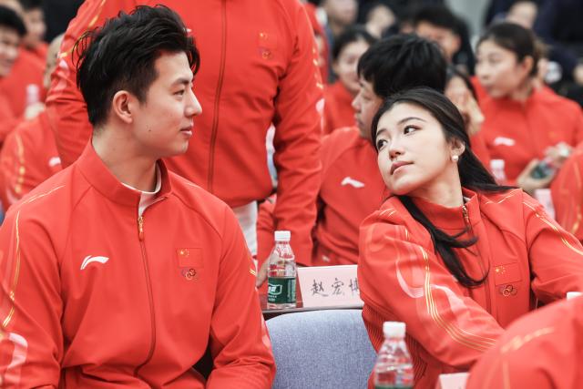(260127) -- BEIJING, Jan. 27, 2026 (Xinhua) -- Figure skaters Wang Shiyue and Liu Xinyu (L) of the Chinese delegation for Milan-Cortina 2026 Olympic Winter Games are seen the inaugural meeting of the Chinese delegation for Milan-Cortina 2026 Olympic Winter Games in Beijing, capital of China, on Jan. 27, 2026. (Xinhua/Na Yuqi)