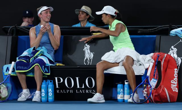 (260127) -- MELBOURNE, Jan. 27, 2026 (Xinhua) -- Zhang Shuai (R)/Elise Mertens communicate during the women's doubles 3rd round match between Zhang Shuai (China)/Elise Mertens (Belgium) and Hailey Baptiste/Peyton Stearns of the United States at the Australian Open tennis tournament in Melbourne, Australia, Jan. 27, 2026. (Xinhua/Ma Ping)