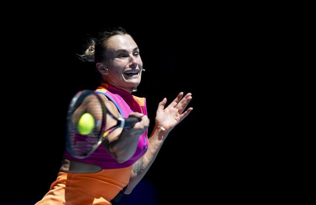 (260127) -- MELBOURNE, Jan. 27, 2026 (Xinhua) -- Aryna Sabalenka of Belarus hits a return during the women's singles quarterfinal match between Aryna Sabalenka of Belarus and Iva Jovic of the United States at the Australian Open tennis tournament in Melbourne, Australia, Jan. 27, 2026. (Photo by Hu Jingchen/Xinhua)