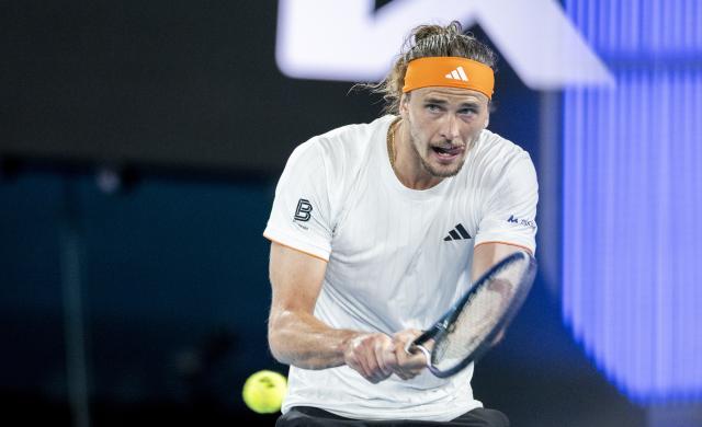(260127) -- MELBOURNE, Jan. 27, 2026 (Xinhua) -- Alexander Zverev of Germany hits a return during the men's singles quarterfinal match between Alexander Zverev of Germany and Learner Tien of the United States at the Australian Open tennis tournament in Melbourne, Australia, Jan. 27, 2026. (Photo by Hu Jingchen/Xinhua)