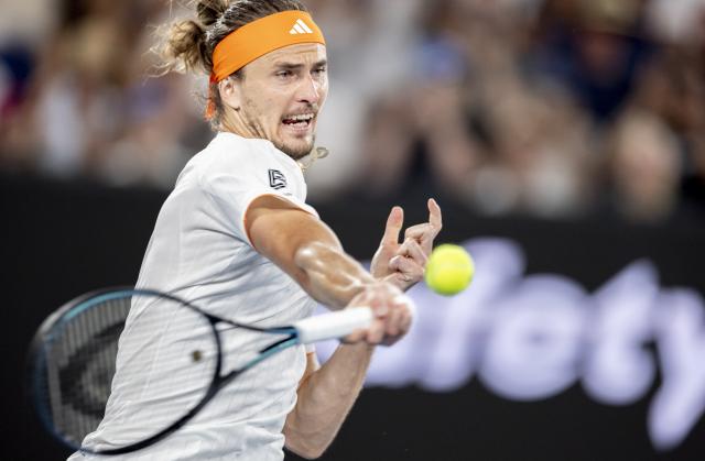 (260127) -- MELBOURNE, Jan. 27, 2026 (Xinhua) -- Alexander Zverev of Germany hits a return during the men's singles quarterfinal match between Alexander Zverev of Germany and Learner Tien of the United States at the Australian Open tennis tournament in Melbourne, Australia, Jan. 27, 2026. (Photo by Hu Jingchen/Xinhua)