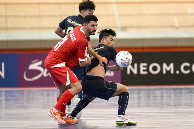 (260127) -- JAKARTA, Jan. 27, 2026 (Xinhua) -- Mario Abou Jaoude (front L) of Lebanon competes during the Group B match between Thailand and Lebanon at the AFC Futsal Asian Cup 2026 in Jakarta International Velodrome, Jakarta, Indonesia, Jan. 27, 2026. (Xinhua/Agung Kuncahya B.)