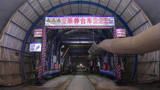 (260127) -- YAN'AN, Jan. 27, 2026 (Xinhua) -- This photo taken on Jan. 27, 2026 shows an interior view of the Jinjiagou tunnel along the Yan'an-Yulin high-speed railway in northwest China's Shaanxi Province. The Jinjiagou tunnel of the Yan'an section along the Yan'an-Yulin high-speed railway was successfully drilled through on Tuesday. The railway, with a designed speed of 350 kilometers per hour, will help to shorten the travel time between Xi'an and Yulin from 5 hours to 2 hours after it is open to the traffic. (Photo by Guo Peng/Xinhua)