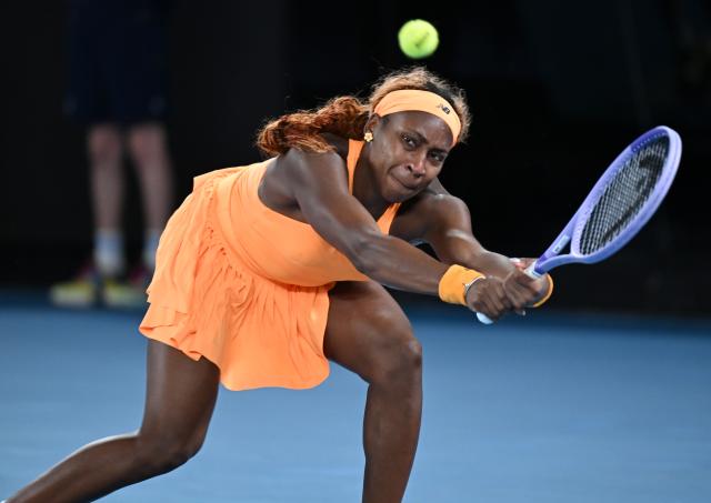 (260127) -- MELBOURNE, Jan. 27, 2026 (Xinhua) -- Coco Gauff hits a return during the women's singles quarterfinal match between Coco Gauff of the United States and Elina Svitolina of Ukraine at the Australian Open tennis tournament in Melbourne, Australia, Jan. 27, 2026. (Photo by Wang Shen/Xinhua)