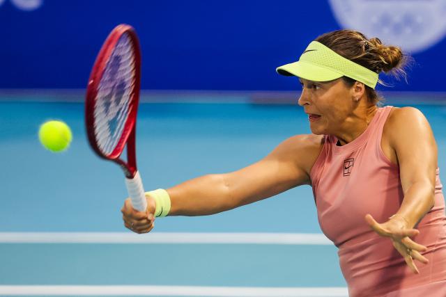 (260127) -- MANILA, Jan. 27, 2026 (Xinhua) -- Tatjana Maria hits a return during the women's singles round of 32 match between Tatjana Maria of Germany and Leolia Jeanjean of France at the WTA Philippine Women's Open in Manila, the Philippines, Jan. 27, 2026. (Xinhua/Rouelle Umali)