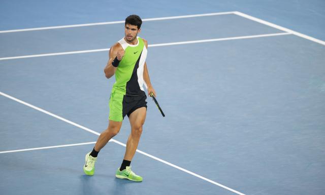 (260127) -- MELBOURNE, Jan. 27, 2026 (Xinhua) -- Carlos Alcaraz celebrates scoring during the men's singles quarterfinal match between Carlos Alcaraz of Spain and Alex de Minaur of Australia at the Australian Open tennis tournament in Melbourne, Australia, Jan. 27, 2026. (Photo by Hu Jingchen/Xinhua)