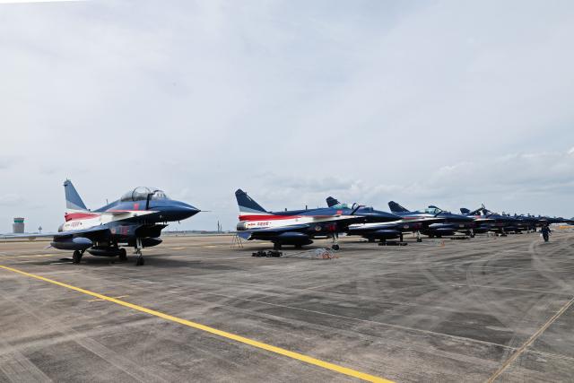 (260127) -- SINGAPORE, Jan. 27, 2026 (Xinhua) -- Aircrafts of the Bayi Aerobatic Team of the Chinese People's Liberation Army (PLA) Air Force are pictured at Singapore's Changi Airport in Singapore, Jan. 27, 2026. Seven J-10 fighter jets from the Bayi Aerobatic Team of the Chinese People's Liberation Army (PLA) Air Force arrived at Singapore's Changi Airport on Tuesday ahead of the 10th Singapore Airshow, scheduled for Feb. 3-8. (Photo by Zhu Jianghai/Xinhua)