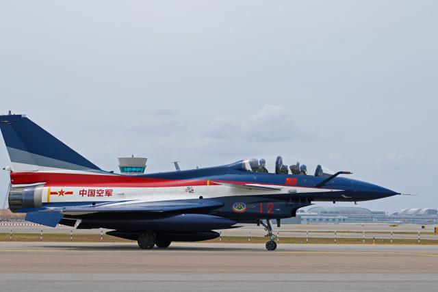 (260127) -- SINGAPORE, Jan. 27, 2026 (Xinhua) -- An aircraft of the Bayi Aerobatic Team of the Chinese People's Liberation Army (PLA) Air Force is pictured at Singapore's Changi Airport in Singapore, Jan. 27, 2026. Seven J-10 fighter jets from the Bayi Aerobatic Team of the Chinese People's Liberation Army (PLA) Air Force arrived at Singapore's Changi Airport on Tuesday ahead of the 10th Singapore Airshow, scheduled for Feb. 3-8. (Photo by Zhu Jianghai/Xinhua)