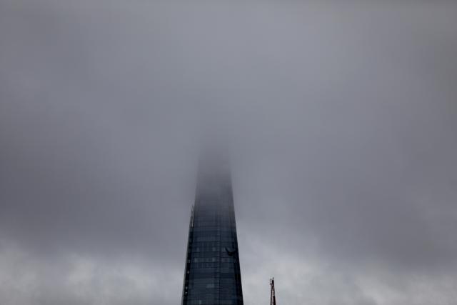 (260127) -- LONDON, Jan. 27, 2026 (Xinhua) -- The top floors of The Shard skyscraper are pictured surrounded by cloud in London, Britain, Jan. 27, 2026, as Storm Chandra hits the country. (Xinhua/Li Ying)