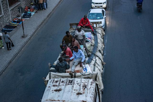 (260127) -- GOMA, Jan. 27, 2026 (Xinhua) -- Local workers are seen on a loaded truck in Goma, eastern Democratic Republic of the Congo (DRC), Jan. 27, 2026. One year after Goma, a regional urban hub in the eastern Democratic Republic of the Congo (DRC), fell to the March 23 Movement (M23) rebel group, the conflict continues to shape daily life in the region. (Str/Xinhua)