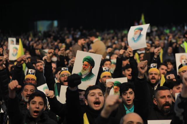 (260128) -- BEIJING, Jan. 28, 2026 (Xinhua) -- Photo taken on Jan. 26, 2026 shows Hezbollah supporters holding portraits of Iranian Supreme Leader Ali Khamenei during a rally to voice support for Iran and denounce U.S. threats in Beirut, Lebanon. (Photo by Bilal Jawich/Xinhua)