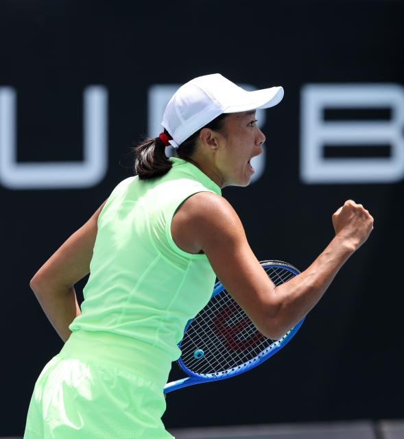 (260128) -- MELBOURNE, Jan. 28, 2026 (Xinhua) -- Zhang Shuai celebrates scoring during the women's doubles quarterfinal match between Zhang Shuai (China)/Elise Mertens (Belgium) and Wu Fang-Hsien (Chinese Taipei)/Hozumi Eri (Japan) at the Australian Open tennis tournament in Melbourne, Australia, Jan. 28, 2026. (Xinhua/Ma Ping)