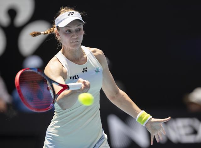 (260128) -- MELBOURNE, Jan. 28, 2026 (Xinhua) -- Elena Rybakina hits a return during the women's singles quarterfinal match between Elena Rybakina of Kazakhstan and Iga Swiatek of Poland at the Australian Open tennis tournament in Melbourne, Australia, Jan. 28, 2026. (Photo by Hu Jingchen/Xinhua)