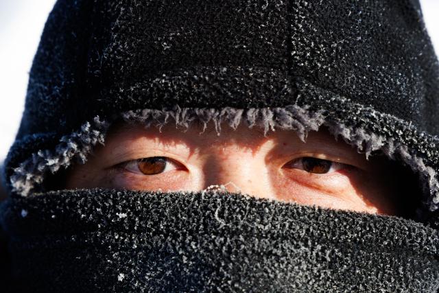 (260128) -- MOHE, Jan. 28, 2026 (Xinhua) -- Engineer Li Qiang is pictured with frosts on his hat not long after working outdoors at the Mohe Station of the China Remote Sensing Satellite Ground Station in Mohe, northeast China's Heilongjiang Province, on Jan. 25, 2026.
  The Mohe Station of the China Remote Sensing Satellite Ground Station is China's northernmost satellite data receiving station. Normally the facility has only one staff member on duty, but as the Spring Festival approaches, four of its staff members have gathered in severe cold weather to conduct thorough winter inspections and maintenance.
  Developed by the Aerospace Information Research Institute under the Chinese Academy of Sciences, the Mohe Station commenced operations on Dec. 12, 2025.
  Located in Mohe, China's northernmost city in Heilongjiang Province, the station is designed to autonomously receive satellite data. It is now tasked with receiving data from 25 national land observation satellites, the institute said.
  The Mohe station boasts a maximum channel downlink data rate of 2 gigabits per second and can transmit the received data in real time. Leveraging its high-latitude geographical advantage, the station can extend the daily receiving time window for polar-orbiting satellites by over 20 percent. (Xinhua/Jin Liwang)
