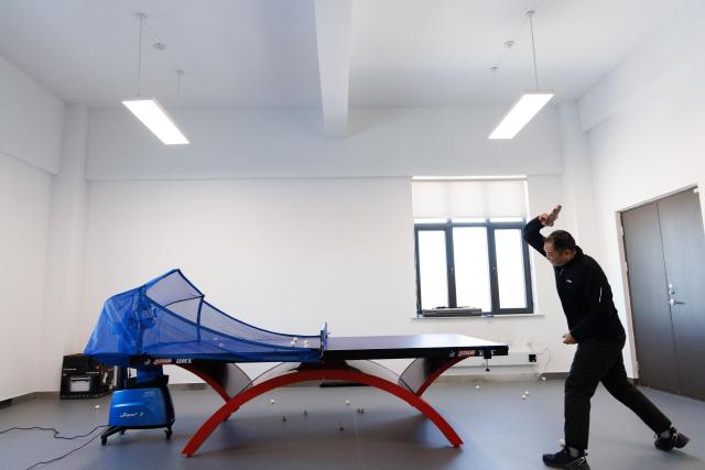 (260128) -- MOHE, Jan. 28, 2026 (Xinhua) -- Shi Shengpu, director of the Mohe Station of the China Remote Sensing Satellite Ground Station, practises table tennis in an activity room at the station in Mohe, northeast China's Heilongjiang Province, on Jan. 25, 2026.
  The Mohe Station of the China Remote Sensing Satellite Ground Station is China's northernmost satellite data receiving station. Normally the facility has only one staff member on duty, but as the Spring Festival approaches, four of its staff members have gathered in severe cold weather to conduct thorough winter inspections and maintenance.
  Developed by the Aerospace Information Research Institute under the Chinese Academy of Sciences, the Mohe Station commenced operations on Dec. 12, 2025.
  Located in Mohe, China's northernmost city in Heilongjiang Province, the station is designed to autonomously receive satellite data. It is now tasked with receiving data from 25 national land observation satellites, the institute said.
  The Mohe station boasts a maximum channel downlink data rate of 2 gigabits per second and can transmit the received data in real time. Leveraging its high-latitude geographical advantage, the station can extend the daily receiving time window for polar-orbiting satellites by over 20 percent. (Xinhua/Jin Liwang)