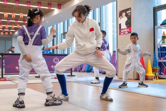 (260128) -- BEIJING, Jan. 28, 2026 (Xinhua) -- Zaparivannaia Mariia from Russia instructs young students at a fencing club in Wuhan, central China's Hubei Province, Jan. 10, 2026. Zaparivannaia is a coach at a fencing club in Wuhan.
  Fueled by China's expanding visa-free policies, inbound travel surged in 2025, with visa-free entries jumping 49.5 percent year-on-year to nearly 30.1 million, official data showed.
  The National Immigration Administration said on Wednesday that international visitors made over 82 million crossings in total, marking a 26.4 percent year-on-year increase.
  Currently, China offers visa-free entry to citizens of 76 countries. Plus, travelers from 55 countries can take advantage of a 240-hour visa-free transit policy at 65 different entry points. 
  Beyond short-term visits, this openness is fostering a vibrant community of international residents. More scholars, students, and professionals are choosing to live and work in China, deepening people-to-people bonds. China, with much to be explored and a lot more to offer, continues to captivate hearts and minds worldwide. (Xinhua/Du Zixuan)