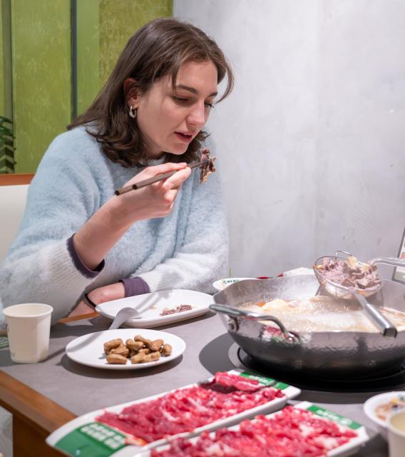 (260128) -- BEIJING, Jan. 28, 2026 (Xinhua) -- Zaparivannaia Mariia from Russia has a hotpot meal in Wuhan, central China's Hubei Province, Jan. 10, 2026. Zaparivannaia is a coach at a fencing club in Wuhan.
  Fueled by China's expanding visa-free policies, inbound travel surged in 2025, with visa-free entries jumping 49.5 percent year-on-year to nearly 30.1 million, official data showed.
  The National Immigration Administration said on Wednesday that international visitors made over 82 million crossings in total, marking a 26.4 percent year-on-year increase.
  Currently, China offers visa-free entry to citizens of 76 countries. Plus, travelers from 55 countries can take advantage of a 240-hour visa-free transit policy at 65 different entry points. 
  Beyond short-term visits, this openness is fostering a vibrant community of international residents. More scholars, students, and professionals are choosing to live and work in China, deepening people-to-people bonds. China, with much to be explored and a lot more to offer, continues to captivate hearts and minds worldwide. (Xinhua/Du Zixuan)