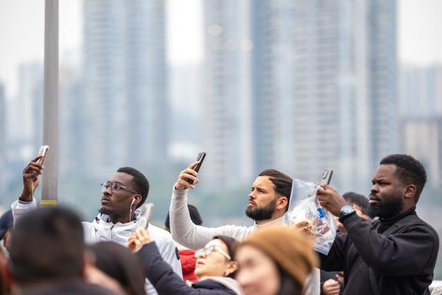 (260128) -- BEIJING, Jan. 28, 2026 (Xinhua) -- Foreign tourists take photos at a sightseeing platform of Liziba in Yuzhong District of southwest China's Chongqing, Jan. 7, 2026.
  Fueled by China's expanding visa-free policies, inbound travel surged in 2025, with visa-free entries jumping 49.5 percent year-on-year to nearly 30.1 million, official data showed.
  The National Immigration Administration said on Wednesday that international visitors made over 82 million crossings in total, marking a 26.4 percent year-on-year increase.
  Currently, China offers visa-free entry to citizens of 76 countries. Plus, travelers from 55 countries can take advantage of a 240-hour visa-free transit policy at 65 different entry points. 
  Beyond short-term visits, this openness is fostering a vibrant community of international residents. More scholars, students, and professionals are choosing to live and work in China, deepening people-to-people bonds. China, with much to be explored and a lot more to offer, continues to captivate hearts and minds worldwide. (Xinhua/Huang Wei)