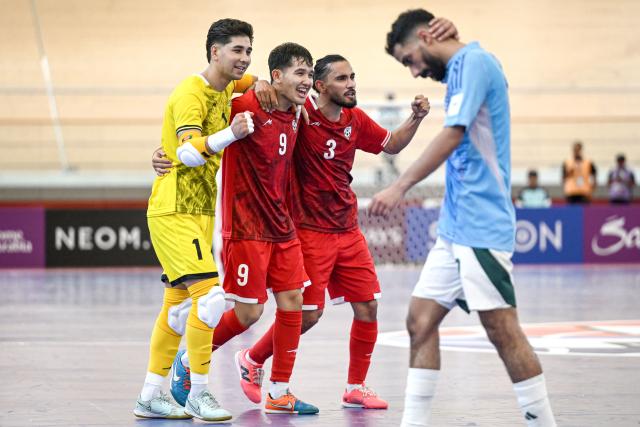 (260128) -- JAKARTA, Jan. 28, 2026 (Xinhua) -- Players of Afghanistan celebrate after scoring during the group D match  between Afghanistan and Saudi Arabia at the AFC Futsal Asian Cup 2026 in Jakarta, Indonesia, Jan. 28, 2026. (Xinhua/Agung Kuncahya B.)