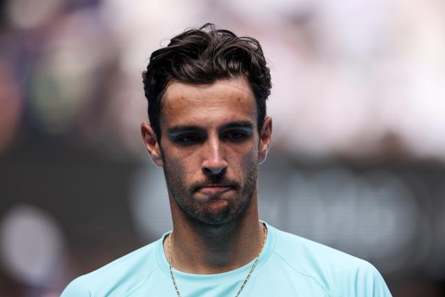(260128) -- MELBOURNE, Jan. 28, 2026 (Xinhua) -- Lorenzo Musetti of Italy reacts during the men's singles quarterfinal match between Novak Djokovic of Serbia and Lorenzo Musetti of Italy at the Australian Open tennis tournament in Melbourne, Australia, Jan. 28, 2026. (Xinhua/Ma Ping)