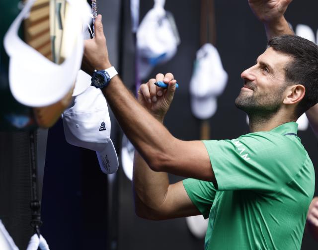 (260128) -- MELBOURNE, Jan. 28, 2026 (Xinhua) -- Novak Djokovic of Serbia greets the audience during the men's singles quarterfinal match between Novak Djokovic of Serbia and Lorenzo Musetti of Italy at the Australian Open tennis tournament in Melbourne, Australia, Jan. 28, 2026. (Xinhua/Ma Ping)