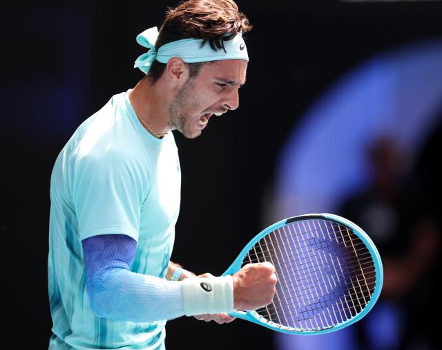 (260128) -- MELBOURNE, Jan. 28, 2026 (Xinhua) -- Lorenzo Musetti of Italy reacts during the men's singles quarterfinal match between Novak Djokovic of Serbia and Lorenzo Musetti of Italy at the Australian Open tennis tournament in Melbourne, Australia, Jan. 28, 2026. (Xinhua/Ma Ping)
