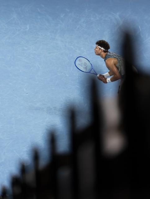 (260128) -- MELBOURNE, Jan. 28, 2026 (Xinhua) -- Ben Shelton reacts during the men's singles quarterfinal match between Ben Shelton of the United States and Jannik Sinner of Italy at the Australian Open tennis tournament in Melbourne, Australia, Jan. 28, 2026. (Photo by Hu Jingchen/Xinhua)