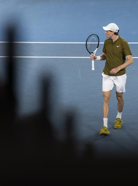 (260128) -- MELBOURNE, Jan. 28, 2026 (Xinhua) -- Jannik Sinner reacts during the men's singles quarterfinal match between Ben Shelton of the United States and Jannik Sinner of Italy at the Australian Open tennis tournament in Melbourne, Australia, Jan. 28, 2026. (Photo by Hu Jingchen/Xinhua)