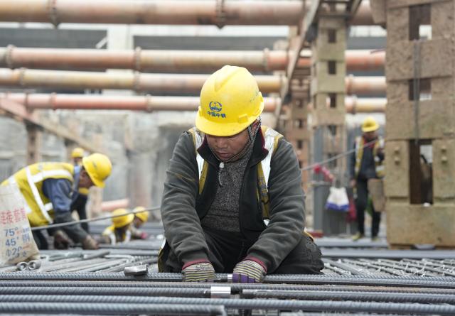 (260128) -- CHENGDU, Jan. 28, 2026 (Xinhua) -- Workers are pictured at the construction site of Chengdu Railway Station upgrade project in Chengdu, southwest China's Sichuan Province, Jan. 28, 2026. At the construction site 40 meters underground, the upgrade project of Chengdu Railway Station is underway. After completion, the station will become a comprehensive transportation hub integrating railway, subway, long-distance bus and others. (Xinhua/Liu Kun)