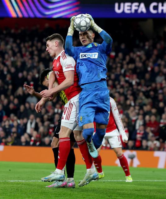 (260129) -- LONDON, Jan. 29, 2026 (Xinhua) -- Kairat Almaty's goalkeeper Temirlan Anarbekov (R) saves the ball during the UEFA Champions League football match between Arsenal and Kairat Almaty in London, Britain, Jan. 28, 2026. (Xinhua/Li Ying)
