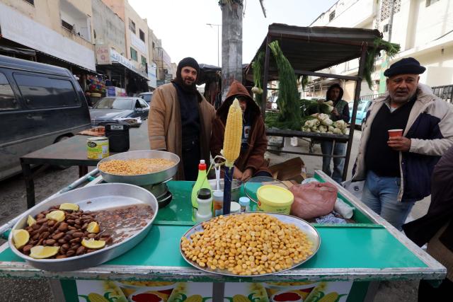 (260129) -- AMMAN, Jan. 29, 2026 (Xinhua) -- A food stall is seen in the Baqa'a refugee camp in Jordan, on Jan. 28, 2026.
  Baqa'a camp is the largest Palestinian refugee camp in Jordan. Lying about 20 kilometers north of Amman, it was set up in 1968, when residents were initially accommodated in temporary tents. Today, most of the camp's inhabitants have built more durable concrete shelters. (Photo by Mohammad Abu Ghosh/Xinhua)