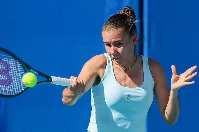 (260129) -- MANILA, Jan. 29, 2026 (Xinhua) -- Tatiana Prozorova hits a return during the women's singles quarterfinal match between Tatiana Prozorova of Russia and Sofia Costoulas of Belgium at the WTA Philippine Women's Open in Manila, the Philippines, Jan. 29, 2026. (Xinhua/Rouelle Umali)