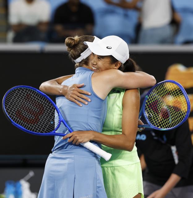 (260129) -- MELBOURNE, Jan. 29, 2026 (Xinhua) -- Zhang Shuai (R)/Elise Mertens react after the women's doubles semifinal match between Zhang Shuai (China)/Elise Mertens (Belgium) and Shibahara Ena (Japan)/Vera Zvonareva (Russia) at the Australian Open tennis tournament in Melbourne, Australia, Jan. 29, 2026. (Xinhua/Ma Ping)