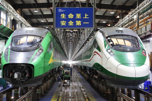 (260129) -- BEIJING, Jan. 29, 2026 (Xinhua) -- Staff members conduct maintenance work at a high-speed train base in Kunming, southwest China's Yunnan Province, Jan. 29, 2026. Railway departments nationwide are actively conducting train maintenance to ensure safe operations during the upcoming 2026 Spring Festival travel rush. (Photo by Yang Zixuan/Xinhua)