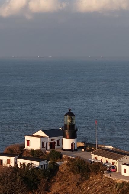 (260129) -- ZHOUSHAN, Jan. 29, 2026 (Xinhua) -- An aerial drone photo taken on Jan. 28, 2026 shows the Huaniao lighthouse in Huaniao Town of Shengsi County in Zhoushan City, east China's Zhejiang Province. The Huaniao lighthouse, built in 1870, is located at the northernmost point of the Zhoushan archipelago on the shipping route from the Yangtze River estuary to the Pacific Ocean. (Xinhua/Huang Zongzhi)