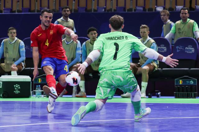 (260130) -- LJUBLJANA, Jan. 30, 2026 (Xinhua) -- Adrian Rivera (L) of Spain shoots during the UEFA Futsal EURO 2026 group match between Spain and Belgium at Arena Stozice, Ljubljana, Slovenia, Jan. 29, 2026. (Photo by Zeljko Stevanic/Xinhua)