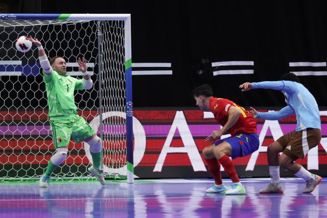 (260130) -- LJUBLJANA, Jan. 30, 2026 (Xinhua) -- Goalkeeper Dries Vrancken (L) of Belgium fails to block during the UEFA Futsal EURO 2026 group match between Spain and Belgium at Arena Stozice, Ljubljana, Slovenia, Jan. 29, 2026. (Photo by Zeljko Stevanic/Xinhua)