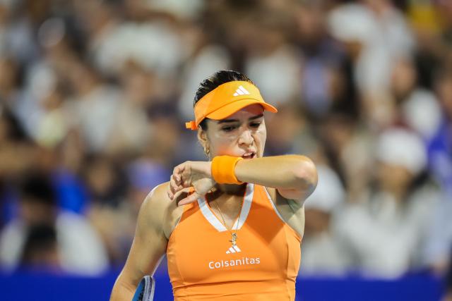 (260130) -- MANILA, Jan. 30, 2026 (Xinhua) -- Camila Osorio of Colombia reacts during the women's singles quarterfinal match between Camila Osorio of Colombia and Alexandra Eala of the Philippines at the WTA Philippine Women's Open in Manila, the Philippines, Jan. 29, 2026. (Xinhua/Rouelle Umali)