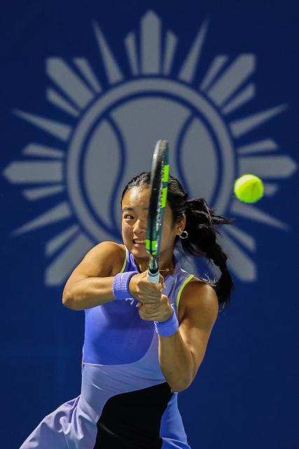 (260130) -- MANILA, Jan. 30, 2026 (Xinhua) -- Alexandra Eala of the Philippines hits a return during the women's singles quarterfinal match between Camila Osorio of Colombia and Alexandra Eala of the Philippines at the WTA Philippine Women's Open in Manila, the Philippines, Jan. 29, 2026. (Xinhua/Rouelle Umali)